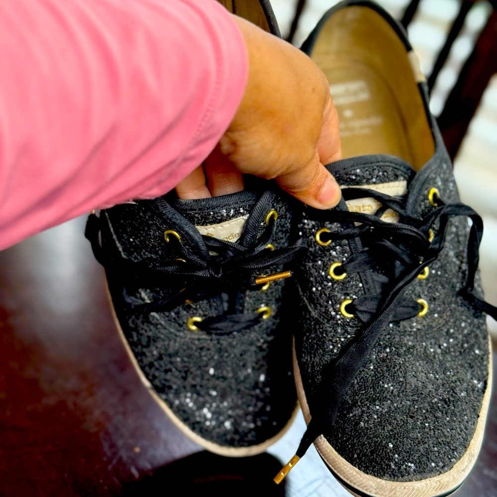 Kate Spade Black and Gold Sneakers with Sleek Design